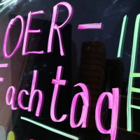 Schrift auf Tafel: OER-Fachtag