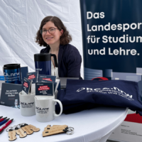 ORCA.nrw-Mitarbeiterin Linda Esch am ORCA.nrw-Stand